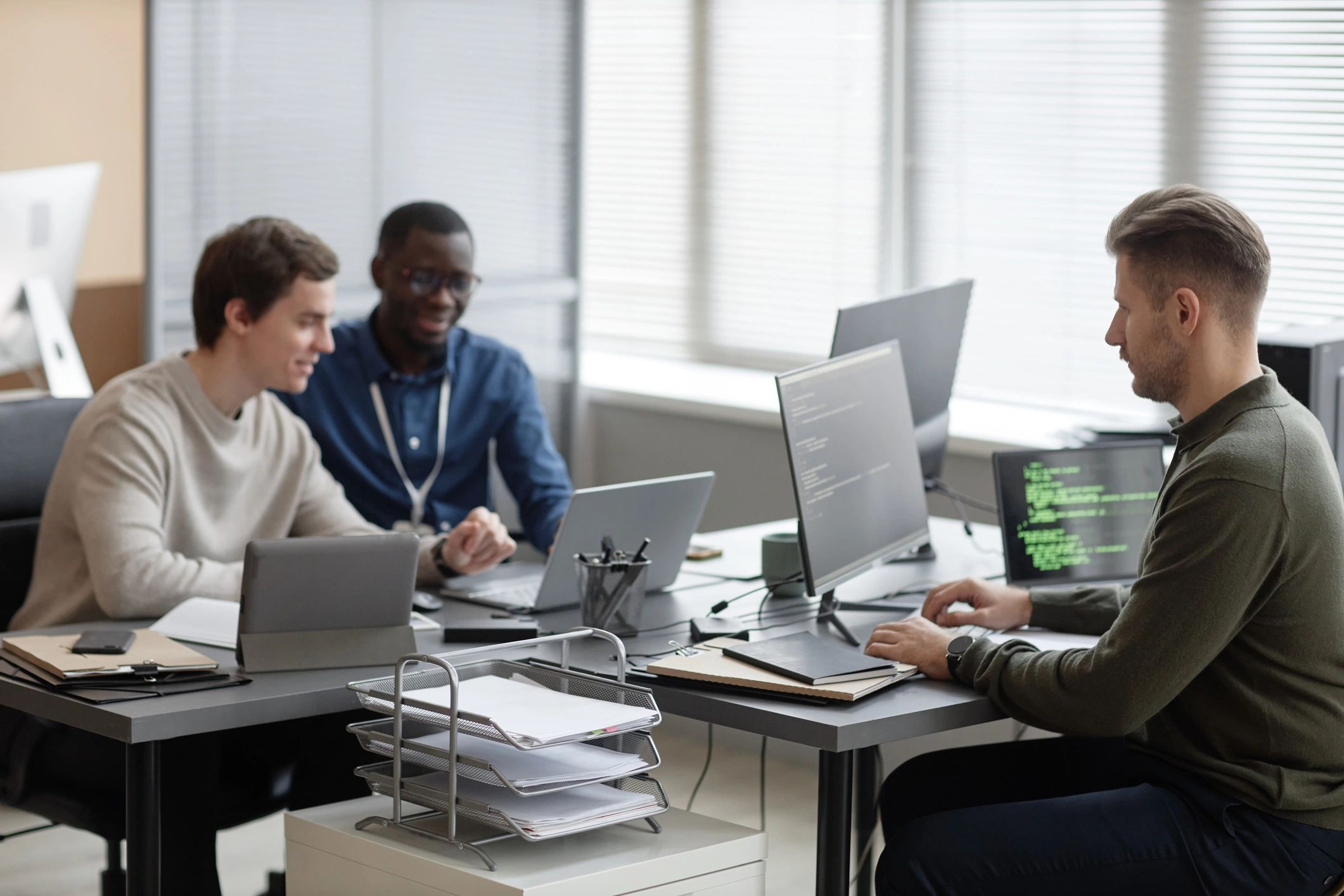 IT team monitoring network and cybersecurity systems